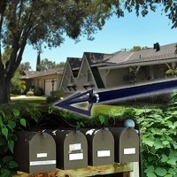 Residences, a cluster of mailboxes, and an arrow