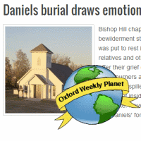 Daniels burial draws emotional crowd