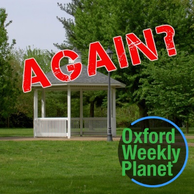 Gazebo in a park with "Again?" and the Oxford Weekly Planet logo in the foreground