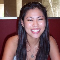 Smiling woman with long dark hair