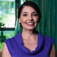 Smiling woman with short dark hair