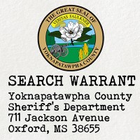 Seal of Yoknapatawpha County with a label 'Search Warrant'