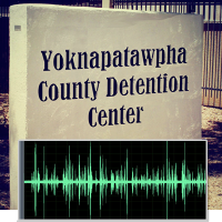 Audio graph with the Yoknapatawpha County Detention Center sign in the background
