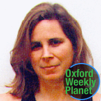 Woman with shoulder-length brown hair with the Oxford Weekly Planet logo in the bottom right corner