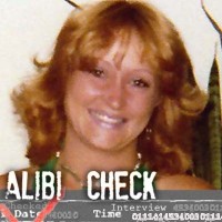Smiling woman with strawberry blonde hair with the label "Alibi Check"