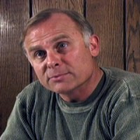 Man with blond hair, graying at the temples