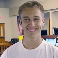 Smiling young man with blond hair