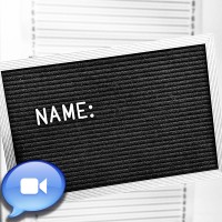 Letter board for an arrestee's name in front of a suspect height chart