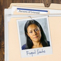 Photo of an unsmiling woman with long dark hair clipped to a manila folder
