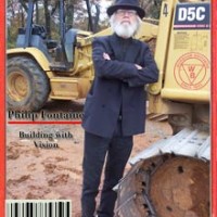 Man with white hair and beard on a magazine cover