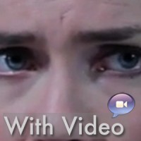 Close-up on a person's eyes with the label "With Video" in the foreground