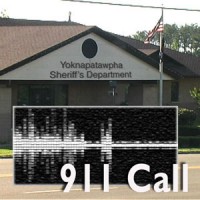Exterior of the sheriff's department with a voice graph and the words "911 Call" overlaid in the foreground