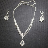 diamond earrings and necklace