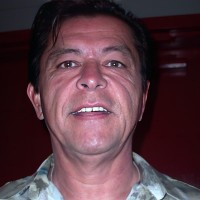 Smiling man with dark hair