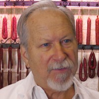 Man with receding gray hair and goatee