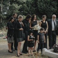 Mourners gathered graveside
