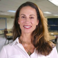 Smiling woman with long brown hair