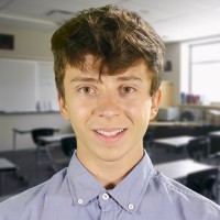 Smiling teen boy with dark hair