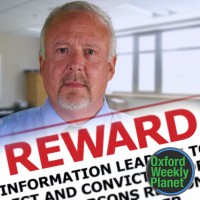 Excerpt of a reward flyer and a Man with receding gray hair and gray mustache and goatee with the Oxford Weekly Planet logo in the foreground