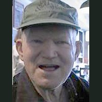 Older man in a gray baseball cap