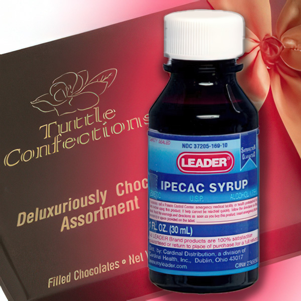 A bottle of ipecac syrup with a box of chocolates in the background