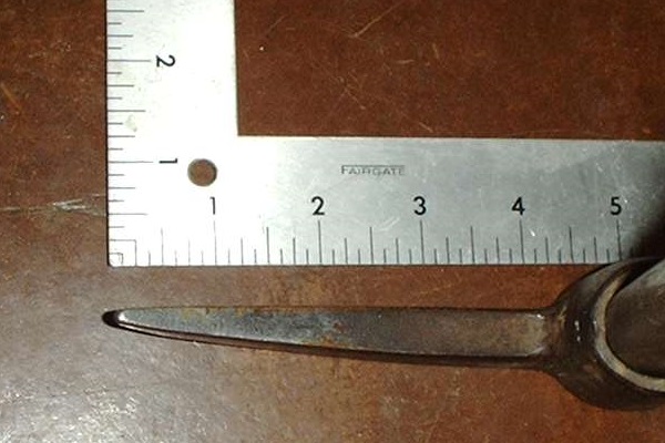 Overhead view of the pointed end of the pickaxe blade