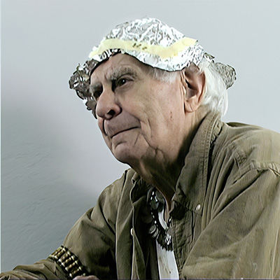 Elderly man wearing a handmade foil hat