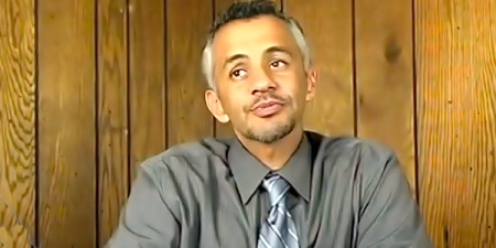 Man with dark hair and graying temples