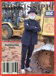 Man with white hair and beard on a magazine cover