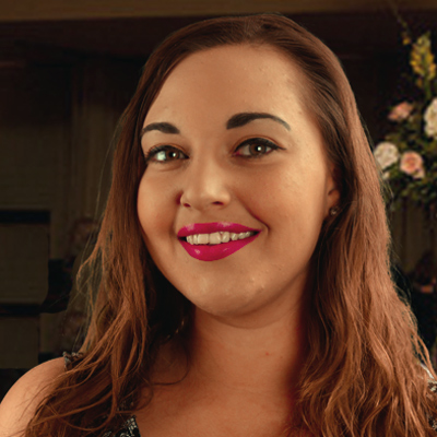 Smiling woman with long dark hair