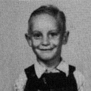 Black & white photo of a young blond boy
