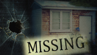 House with broken glass and the word 'Missing' in the foreground