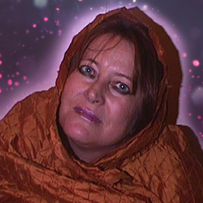 Woman with a scarf wrapped around her head and shoulders