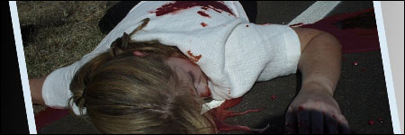 Woman on ground with blood. Dead