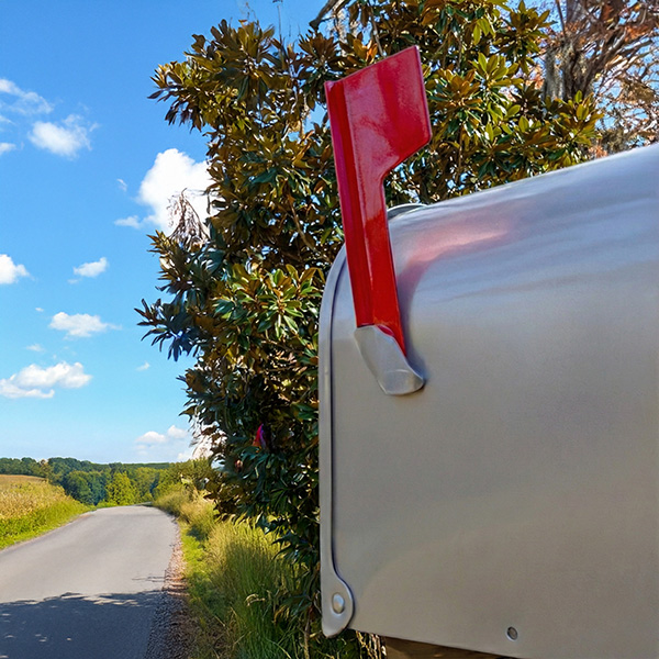 Residential mailbox with the flag up