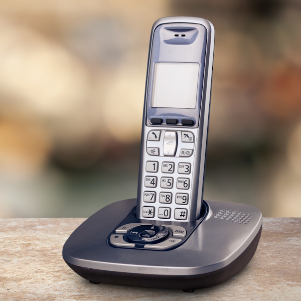 Cordless telephone with cradle