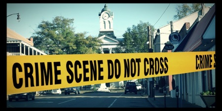 Yoknapatawpha County Courthouse with crime scene tape in the foreground