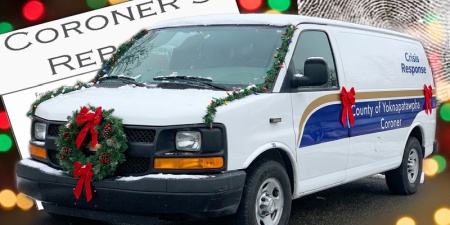 Coroner's van with a coroner's report in the background