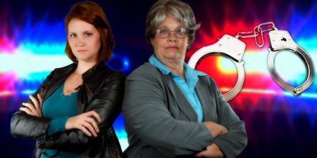 Woman with short red hair and a woman with short gray hair, both with arms folded, and police lights and handcuffs in the background