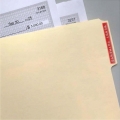 File folder labeled 'Wendy Payments' with portions of the checks inside visible