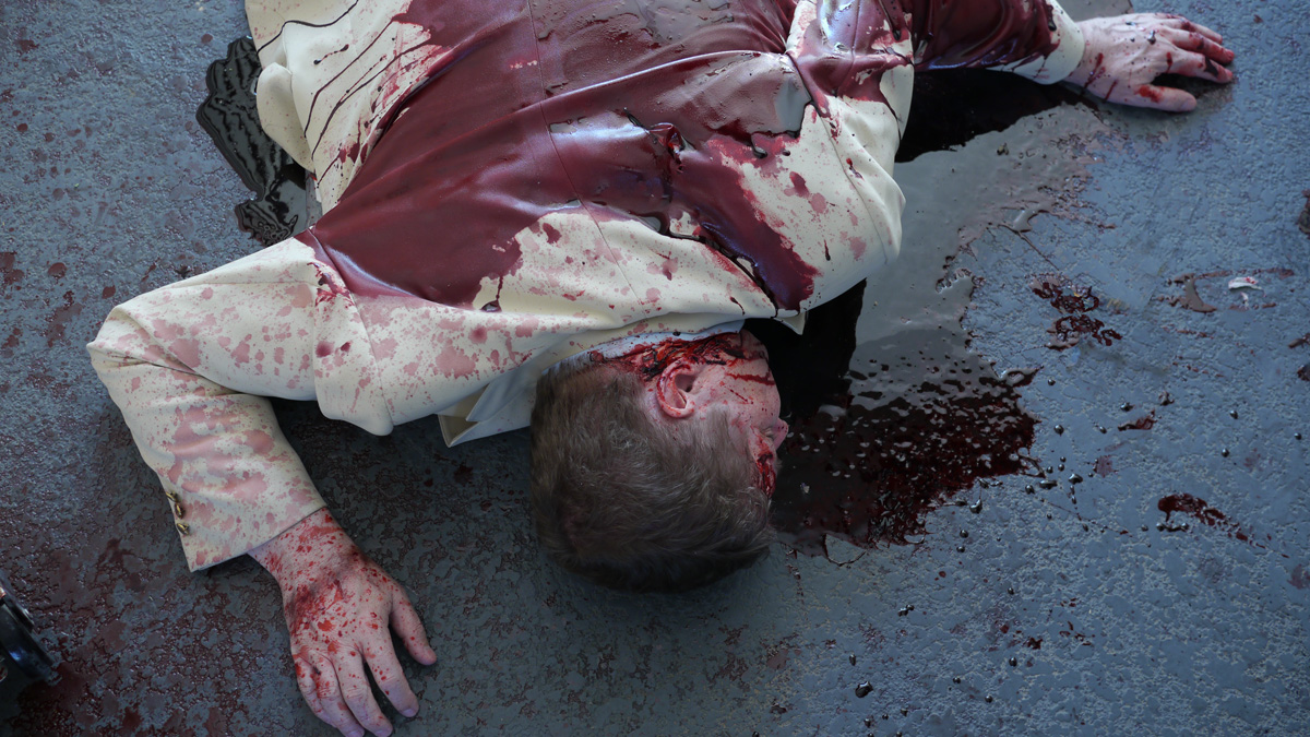 man dead in a pool of blood