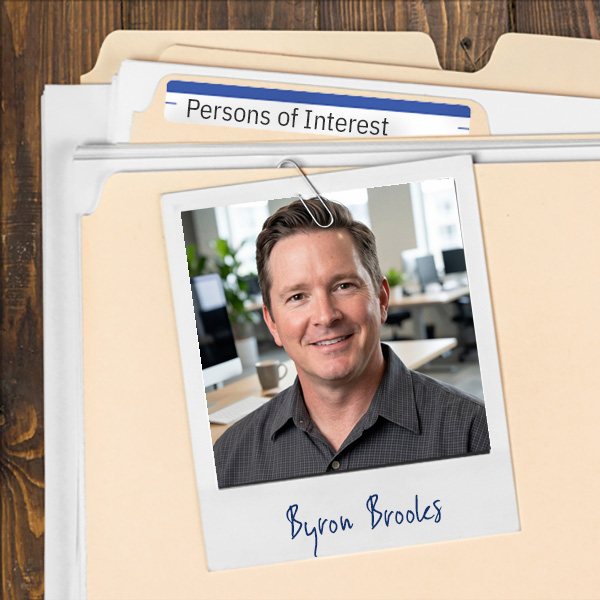 A file folder with a photo of a clean-shaven man with brown hair.
