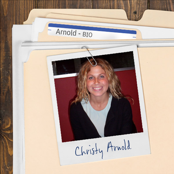 A file folder with a photo of a smiling young woman with long blonde hair.