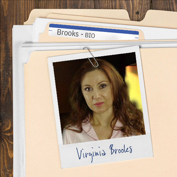 A file folder with a photo of a woman with long dark hair.