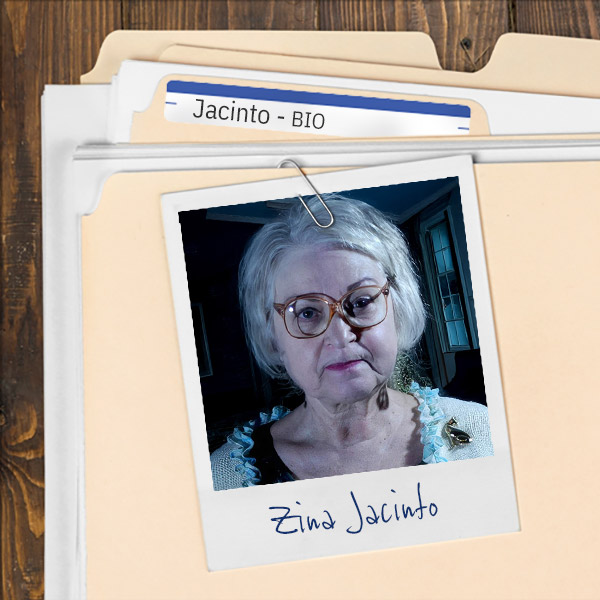 A file folder with a photo of a Stern-looking gray-haired woman with glasses.