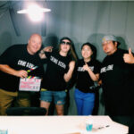 a group picture of 4 people who work behind the scenes.