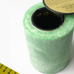 A picture of a green candle-safe