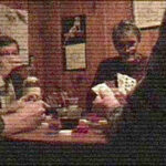 an old looking picture of 4 men sitting around a table playing poker and drinking alcohol.