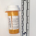 A picture of a prescription pill box.