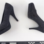 a picture of a pair of black heel shoes.